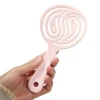 Factory direct sales of lollipop round hollowed-out colored plastic massage combs Application Scenario